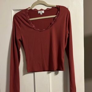 Super cute burnt orange crop long sleever